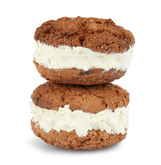 Sweet delicious ice cream cookie sandwiches on white background