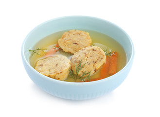 Bowl of Jewish matzoh balls soup isolated on white