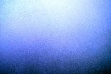 Graduated blue metallic surface.