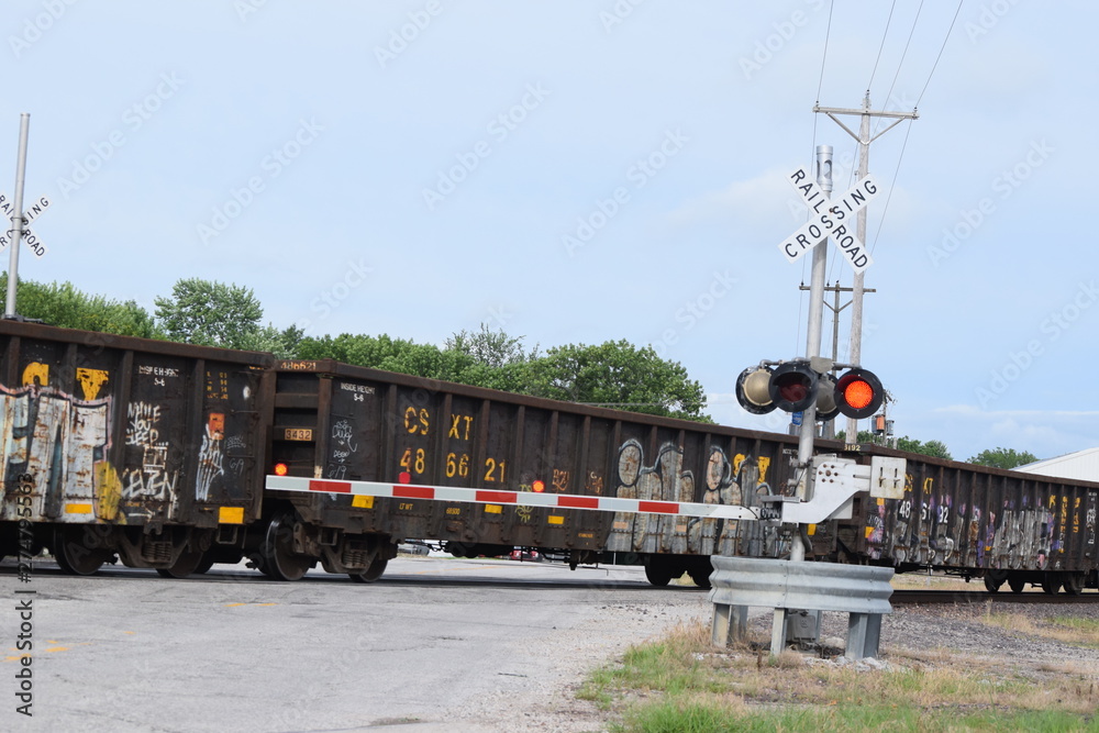 Sticker train at a railroad crossing