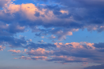 Naklejka na ściany i meble Colorful clouds on dramatic sunset sky