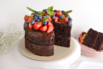 Stand with tasty chocolate cake