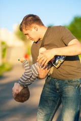 Young Father Playing With is Son