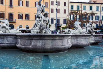 Clear water fountain with human sculptures
