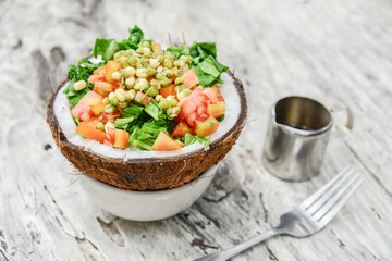 Salad with tomato and coconut pulp
