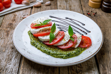 Caprese salad with mozzarella and tomato
