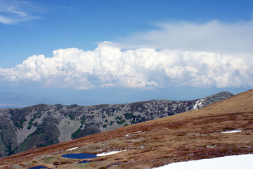 landscape with mountains and blue sky