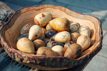 eggs made of wood in the basket for Easter