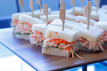 sandwich with crab sticks, tomato, and lettuce on catering banquet table © leisuretime70
