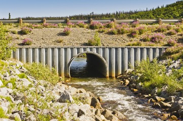 Creek and culvert along the Alaska highway in Yukon, Canada - obrazy, fototapety, plakaty