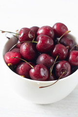 red cherries in a bowl