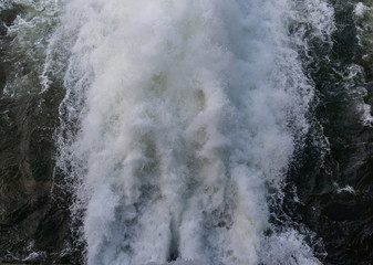 Fototapeta na wymiar Rushing Water Releases from Dam