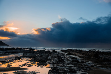 Waves and Rocks at Beach at Sunrise