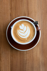 Hot coffee cappuccino on wood table