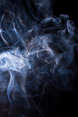 Smoke on a black background.