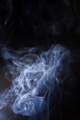 Smoke on a black background.
