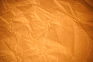 Brown crumpled paper background.