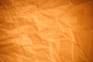 Brown crumpled paper background.