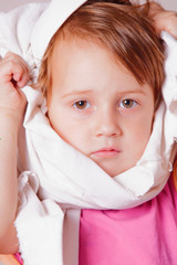 Portrait of unhappy cute little child girl having toothache