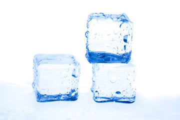 Blue ice cubes on white background.