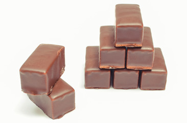 Chocolate sweets on white background. Delicious dessert