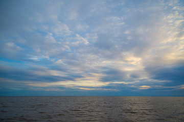 water and blue sky before sunset