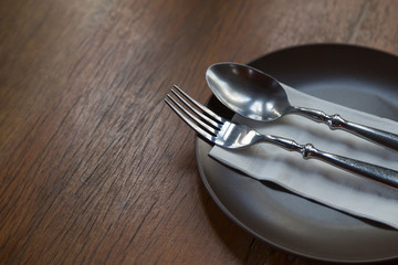 fork and spoon on plate