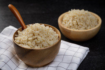 Healthy quinoa in the wooden bowl, Healthy food habits and concept of balanced diet
