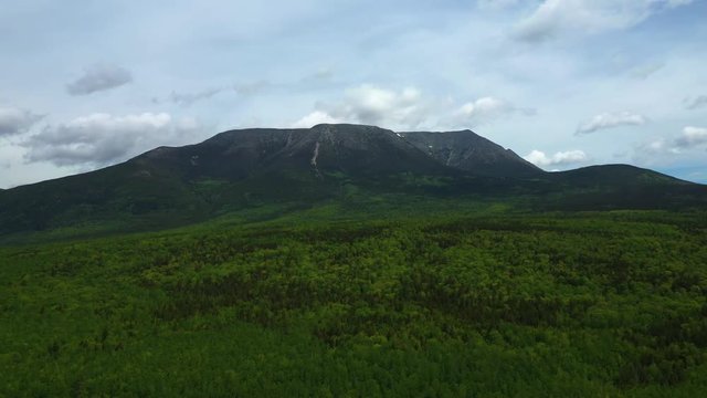 Hyperlapse flying over Baxter State Park towards Mount Katahdin Late Spring AERIAL