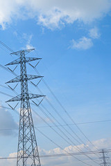 Electricity concept. Close up high voltage power lines station.