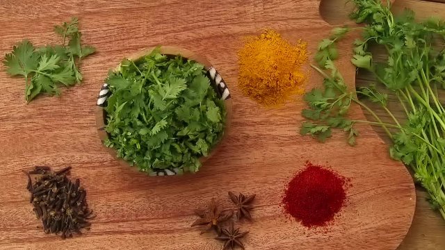 Vegetable cooking preparation chopping table top colourful tasty onion tomato herbs masala vegan