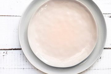 empty plates on a white background