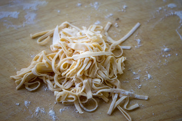 cutting noodles on the board