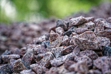 Road gravel and granite gravel texture. Crushed Gravel background. Pile of Stones texture. Industrial coals