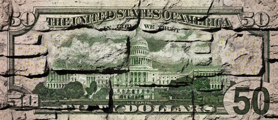 US Dollar banknote on a brick wall