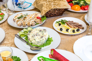 Dishes on a served banquet table  in restaurant
