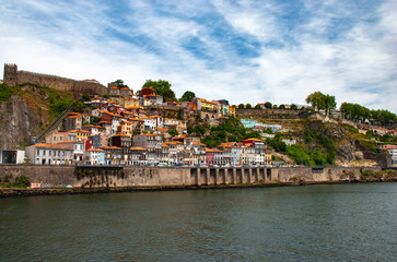 Fototapeta na wymiar The Fernandina Wall (Muralha Fernandina) medieval castle overlooking the Douro River in Porto, Portugal