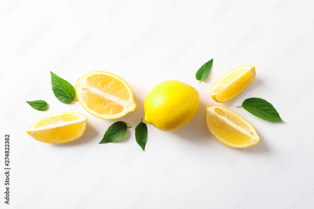 Wall mural flat lay composition with lemons on white background, space for text