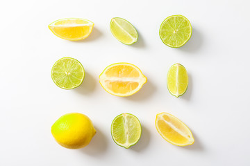 Flat lay composition with citrus on white background, space for text