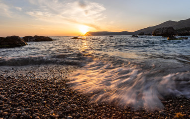 Obraz premium Beautiful seascape during storm. Colorful sunset on the sea