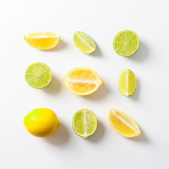 Flat lay composition with citrus on white background, space for text
