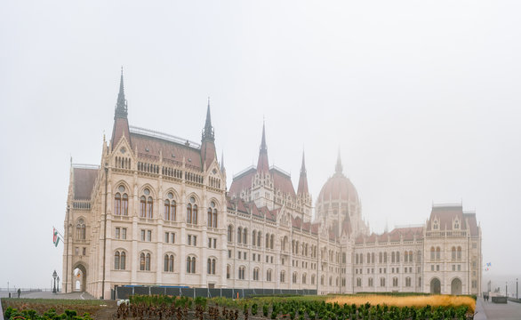 Foggy view of the Hungarian Parliament Building in a haze morning