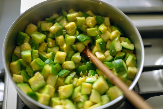 Macro close-up of zapallitos cut into pieces boiling in a pan