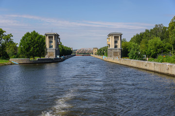 Fototapeta na wymiar River lock on the Moscow Canal. Water facilities for navigation ships.