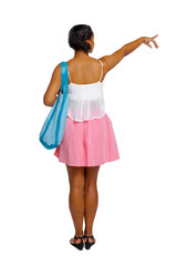 Back view of an afro american woman with an inflatable circle which points hand up.