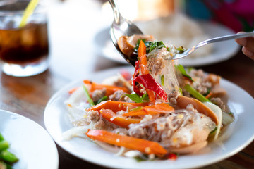 spicy thai food so yummy call (Yum woon sen). soft focus. © iHaMoo