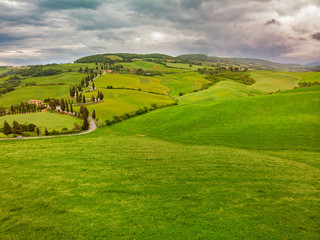 Fototapeta na wymiar Typical landscape of the Val d'Orcia in Tuscany, Italy. Aerial v