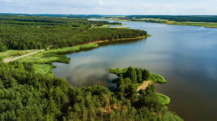 Fototapeta na wymiar forest lake aerial photography with drone.