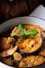 Veal goulash with baked aubergine and herbs