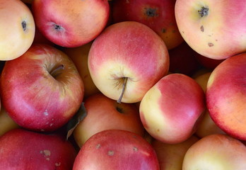 Apples on the market. Fresh organic red apples from the local farmers market. Apples background background texture seasoning Apples for sale. 